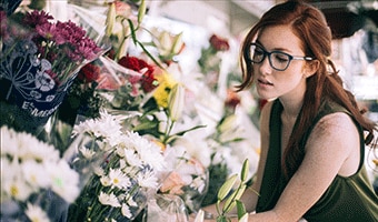 Women in flower shop wearing Classic Specs