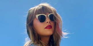Taylor Swift’s Love Affair With Glasses: Get the Look Taylor Swift wearing sunglasses and a floral top.