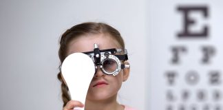 10 Tips to Protect Your Child’s Eyes and Vision child-in-special-glasses-with-eye-closed-checking-vision