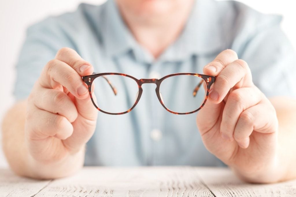optometrist-giving-new-glasses