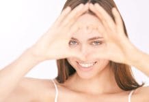 Is 20/20 Vision Truly Perfect Eyesight? young-beautiful-woman-heart-gesture