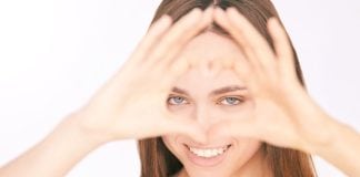 Is 20/20 Vision Truly Perfect Eyesight? young-beautiful-woman-heart-gesture