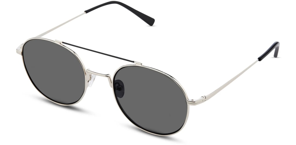 Classic Specs Lindsey Aviator Sunglasses in a semi-side view with dark lens and silver frames.